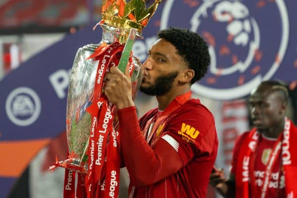 LIVERPOOL, ENGLAND - Wednesday, July 22, 2020: Liverpool’s Joe Gomez kisses the Premier League trophy and his winners' medal as the Reds are crowned Champions after the FA Premier League match between Liverpool FC and Chelsea FC at Anfield. The game was played behind closed doors due to the UK government’s social distancing laws during the Coronavirus COVID-19 Pandemic. (Pic by David Rawcliffe/Propaganda)