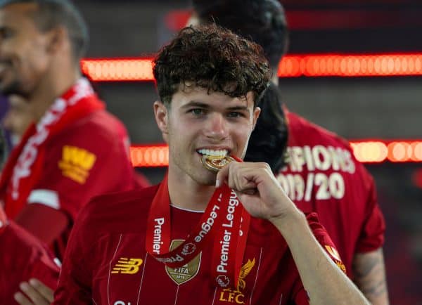 LIVERPOOL, ENGLAND - Wednesday, July 22, 2020: Liverpool’s Neco Williams bites his winners' medal as the Reds are crowned Champions after the FA Premier League match between Liverpool FC and Chelsea FC at Anfield. The game was played behind closed doors due to the UK government’s social distancing laws during the Coronavirus COVID-19 Pandemic. (Pic by David Rawcliffe/Propaganda)