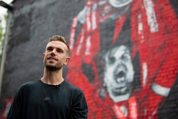 LIVERPOOL, ENGLAND - Saturday, July 25, 2020: Liverpool's captain Jordan Henderson views the new street art mural of himself lifting the FA Premier League trophy painted on a gabel end in Sybil Road, Anfield. The mural was commissioned by fan TV channel The Redmen TV. (Pic by David Rawcliffe/Propaganda)