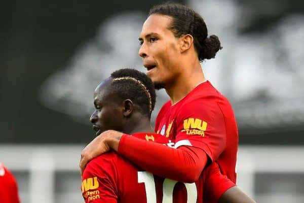 LIVERPOOL, ENGLAND - Sunday, July 26, 2020: Liverpool’s Sadio Mané (L) celebrates with team-mate Virgil van Dijk after scoring the third goal during the final match of the FA Premier League season between Newcastle United FC and Liverpool FC at St. James' Park. The game was played behind closed doors due to the UK government’s social distancing laws during the Coronavirus COVID-19 Pandemic. Liverpool won 3-1 and finished the season as Champions on 99 points. (Pic by Propaganda)