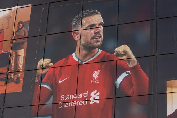 LIVERPOOL, ENGLAND - Monday, August 3, 2020: An image of Liverpool's captain Jordan Henderson wearing the new Nike home shirt on the Spion Kop at Anfield. Liverpool's new kit supplier Nike replaces New Balance in a five year deal reported to be worth $39.5 per year. (Pic by David Rawcliffe/Propaganda)