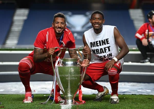 LISBON, PORTUGAL - Sunday, August 23, 2020: FC Bayern Munich's Jerome Boateng (L) and David Alaba celebrate with the European Cup trophy as Bayern win it for the sixth time after the UEFA Champions League Final between FC Bayern Munich and Paris Saint-Germain at the Estadio do Sport Lisboa e Benfica. FC Bayern Munich won 1-0. (Credit: ©UEFA)