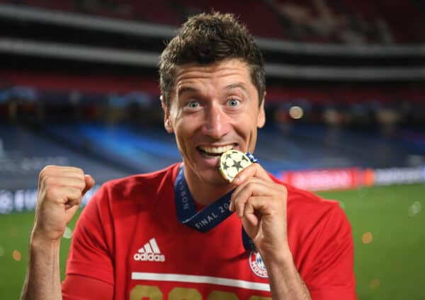 LISBON, PORTUGAL - Sunday, August 23, 2020: FC Bayern Munich’s Robert Lewandowski bites his winners’ medal after the UEFA Champions League Final between FC Bayern Munich and Paris Saint-Germain at the Estadio do Sport Lisboa e Benfica. FC Bayern Munich won 1-0. (Credit: ©UEFA)