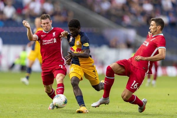 SALZBURG, AUSTRIA - Tuesday, August 25, 2020: FC Red Bull Salzburg's Sékou Koïta (C) is tackled by Liverpool's James Milner (L) and Marko Grujic (R) during a preseason friendly match between FC Red Bull Salzburg and Liverpool FC at the Red Bull Arena. (Pic by Propaganda)