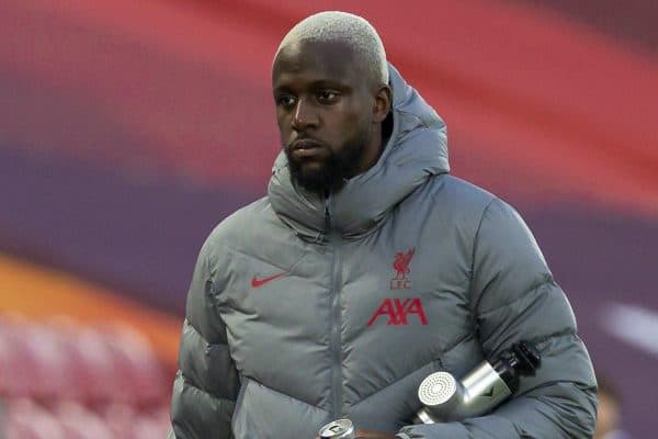 LIVERPOOL, ENGLAND - Saturday, September 12, 2020: Liverpool’s substitute Divock Origi walks past manager Jürgen Klopp during the opening FA Premier League match between Liverpool FC and Leeds United FC at Anfield. The game was played behind closed doors due to the UK government’s social distancing laws during the Coronavirus COVID-19 Pandemic. Liverpool won 4-3. (Pic by David Rawcliffe/Propaganda)