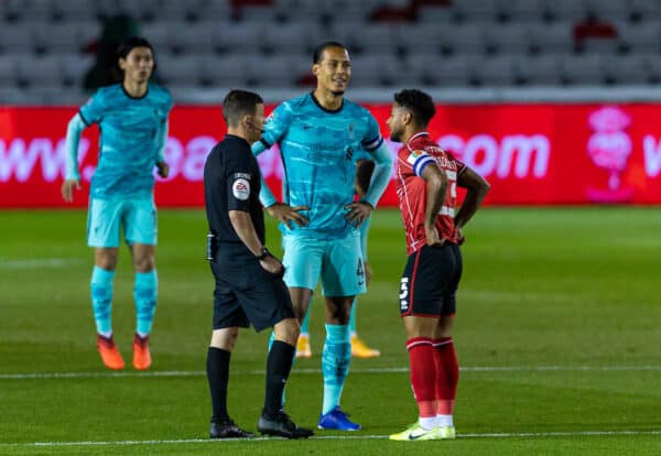 LINCOLN, ENGLAND - Thursday, September 24, 2020: Liverpool's captain Virgil van Dijk and Lincoln City FC's captain Liam Bridcutt with referee Tony Harrington for the coin toss before the Football League Cup 3rd Round match between Lincoln City FC and Liverpool FC at Sincil Bank. Liverpool won 7-2. (Pic by David Rawcliffe/Propaganda)