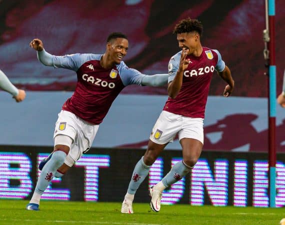 BIRMINGHAM, ENGLAND - Sunday, October 4, 2020: Aston Villa's Ollie Watkins (R) celebrates with team-mate Ezri Konsa Ngoyo (L) after scoring the fourth goal, completing his hat-trick and making the score 4-1, during the FA Premier League match between Aston Villa FC and Liverpool FC at Villa Park. The game was played behind closed doors due to the UK government’s social distancing laws during the Coronavirus COVID-19 Pandemic. Aston Villa won 7-2. (Pic by David Rawcliffe/Propaganda)