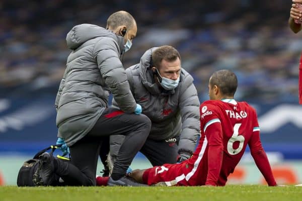 LIVERPOOL, ENGLAND - Saturday, October 17, 2020: Liverpool’s Thiago Alcantara is treated for an injury by physio Chris Morgan and club doctor Jim Moxon during the FA Premier League match between Everton FC and Liverpool FC, the 237th Merseyside Derby, at Goodison Park. The game was played behind closed doors due to the UK government’s social distancing laws during the Coronavirus COVID-19 Pandemic. The game ended in a 2-2 draw. (Pic by David Rawcliffe/Propaganda)