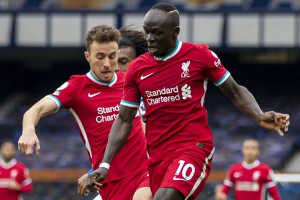 LIVERPOOL, ENGLAND - Saturday, October 17, 2020: Liverpool’s Diogo Jota (L) and Sadio Mané challenge for the ball during the FA Premier League match between Everton FC and Liverpool FC, the 237th Merseyside Derby, at Goodison Park. The game was played behind closed doors due to the UK government’s social distancing laws during the Coronavirus COVID-19 Pandemic. The game ended in a 2-2 draw. (Pic by David Rawcliffe/Propaganda)