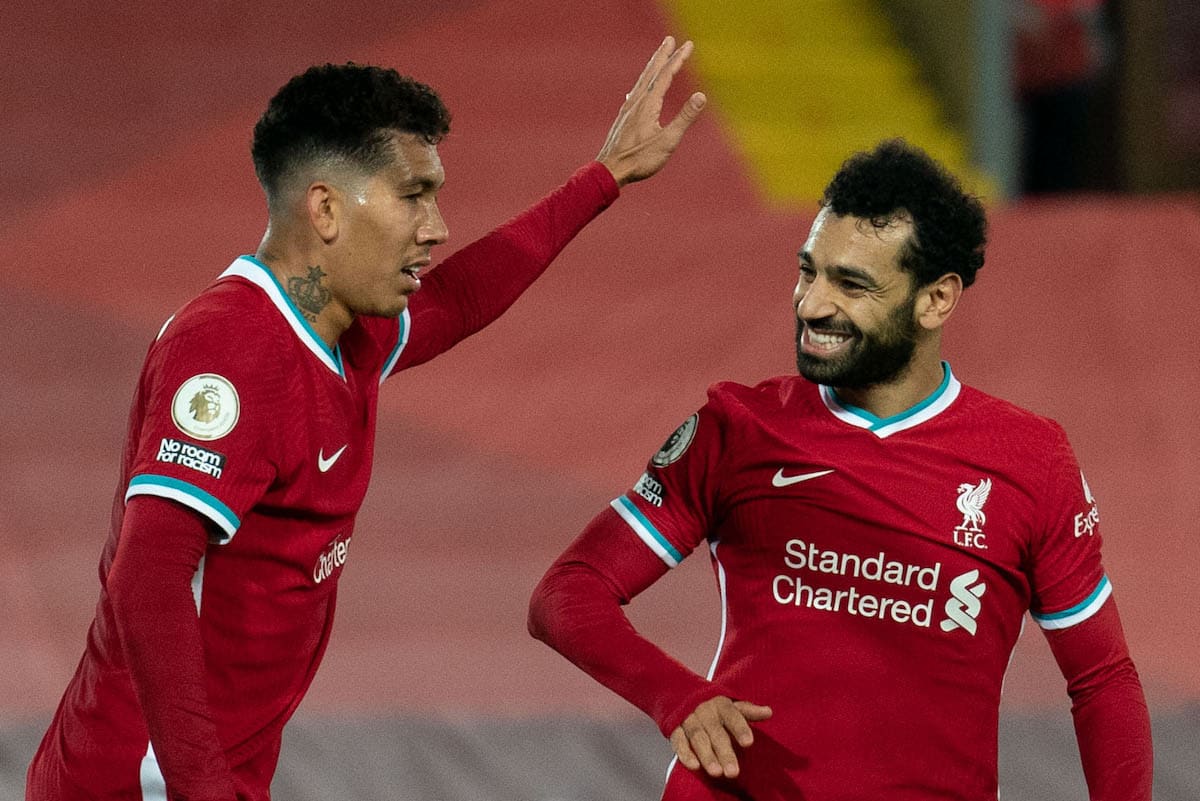 LIVERPOOL, ENGLAND - Saturday, October 24, 2020: Liverpool’s Roberto Firmino (L) celebrates with team-mate Mohamed Salah (R) after the equalising goal from a rebound to level the score at 1-1 during the FA Premier League match between Liverpool FC and Sheffield United FC at Anfield. The game was played behind closed doors due to the UK government’s social distancing laws during the Coronavirus COVID-19 Pandemic. (Pic by Propaganda)