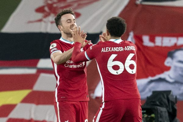 LIVERPOOL, ENGLAND - Saturday, October 24, 2020: Liverpool’s Diogo Jota celebrates with team-mate Trent Alexander-Arnold after scoring the second goal to give his side a 2-1 lead during the FA Premier League match between Liverpool FC and Sheffield United FC at Anfield. The game was played behind closed doors due to the UK government’s social distancing laws during the Coronavirus COVID-19 Pandemic. (Pic by Propaganda)