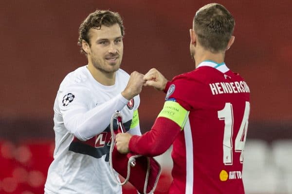 LIVERPOOL, ENGLAND - Tuesday, October 27, 2020: FC Midtjylland's captain Erik Sviatchenko (L) and Liverpool's captain Jordan Henderson before the UEFA Champions League Group D match between Liverpool FC and FC Midtjylland at Anfield. Liverpool won 2-0. (Pic by David Rawcliffe/Propaganda)