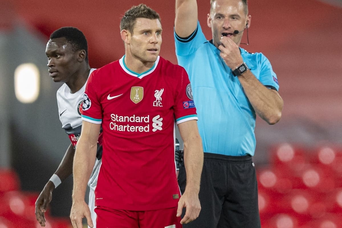 LIVERPOOL, ENGLAND - Tuesday, October 27, 2020: Liverpool's James Milner is shown a yellow card by referee Pawe? Raczkowski during the UEFA Champions League Group D match between Liverpool FC and FC Midtjylland at Anfield. Liverpool won 2-0. (Pic by David Rawcliffe/Propaganda)