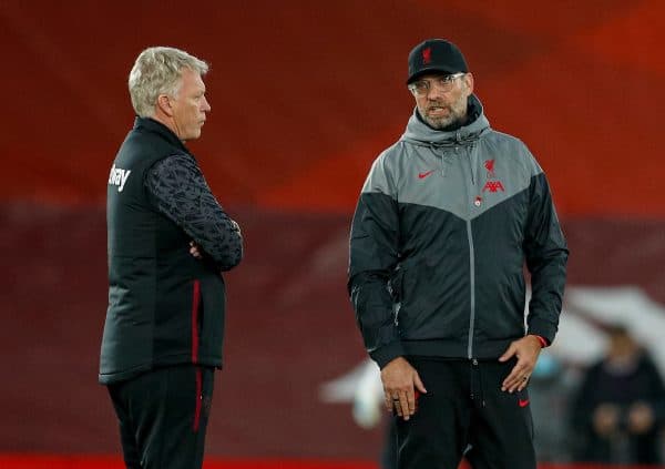 LIVERPOOL, ENGLAND - Saturday, October 31, 2020: Liverpool’s manager Jürgen Klopp (R) chats with West Ham United's manager David Moyes before the FA Premier League match between Liverpool FC and West Ham United FC at Anfield. The game was played behind closed doors due to the UK government’s social distancing laws during the Coronavirus COVID-19 Pandemic. (Pic by Propaganda)