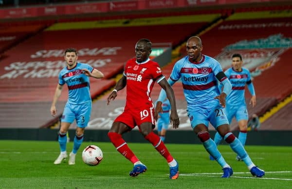 LIVERPOOL, ENGLAND - Saturday, October 31, 2020: Liverpool’s Sadio Mané (L) and West Ham United's Angelo Ogbonna during the FA Premier League match between Liverpool FC and West Ham United FC at Anfield. The game was played behind closed doors due to the UK government’s social distancing laws during the Coronavirus COVID-19 Pandemic. (Pic by Propaganda)