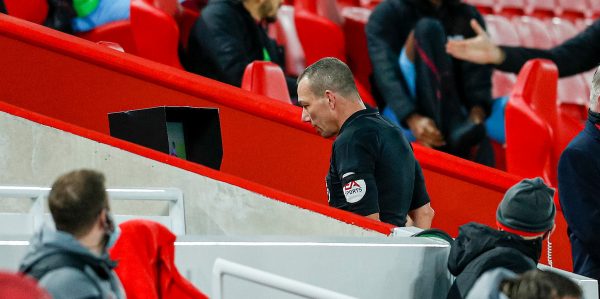 LIVERPOOL, ENGLAND - Saturday, October 31, 2020: Referee Kevin Friend reviews an incident on the VAR screen before disallowing a Liverpool goal during the FA Premier League match between Liverpool FC and West Ham United FC at Anfield. The game was played behind closed doors due to the UK government’s social distancing laws during the Coronavirus COVID-19 Pandemic. (Pic by Propaganda)