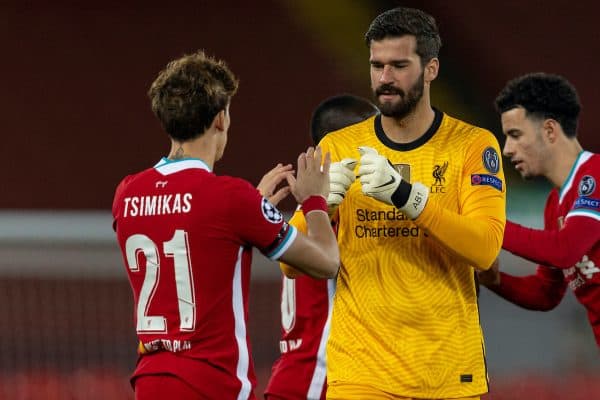 LIVERPOOL, ENGLAND - Wednesday, November 25, 2020: Liverpool's goalkeeper Alisson Becker (R) fist bumps Kostas Tsimikas before the UEFA Champions League Group D match between Liverpool FC and Atalanta BC at Anfield. Atalanta won 2-0. (Pic by David Rawcliffe/Propaganda)