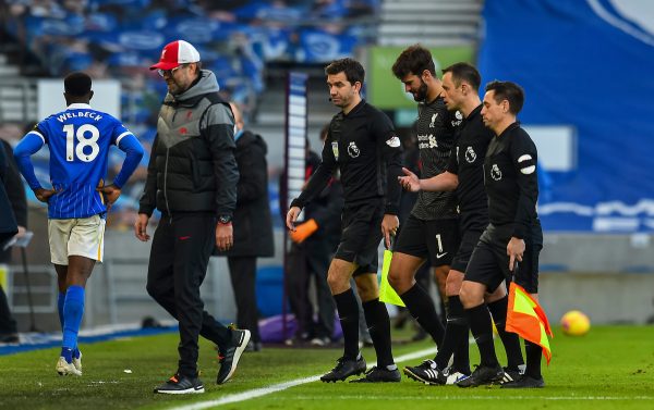 BRIGHTON & HOVE, ENGLAND - Saturday, November 28, 2020: Liverpool's goalkeeper Alisson Becker speaks with referee Stuart Atwell after the FA Premier League match between Brighton & Hove Albion FC and Liverpool FC at the AMEX Stadium. The game was played behind closed doors due to the UK government’s social distancing laws during the Coronavirus COVID-19 Pandemic. (Pic by Propaganda)