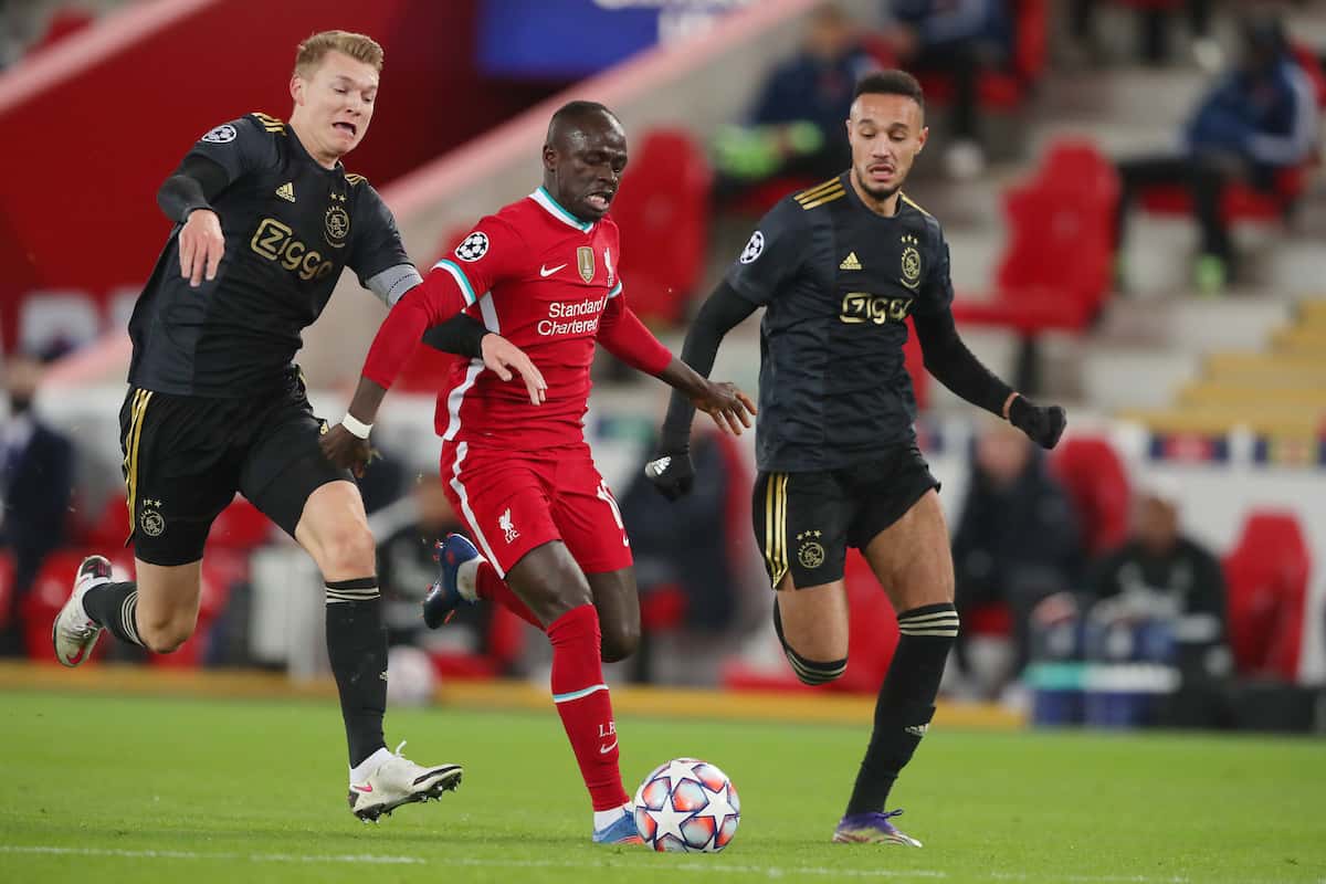 LIVERPOOL, ENGLAND - Tuesday, December 1, 2020: Sadio Mané of Liverpool and Perr Schuurs of Ajax during the UEFA Champions League Group D match between Liverpool FC and AFC Ajax at Anfield. (Pic by Paul Greenwood/Propaganda)