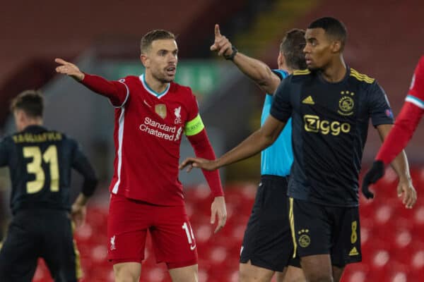 LIVERPOOL, ENGLAND - Tuesday, December 1, 2020: Liverpool's captain Jordan Henderson speaks with the referee during the UEFA Champions League Group D match between Liverpool FC and AFC Ajax at Anfield. Liverpool won 1-0 to win the group and progress to the Round of 16. (Pic by David Rawcliffe/Propaganda)