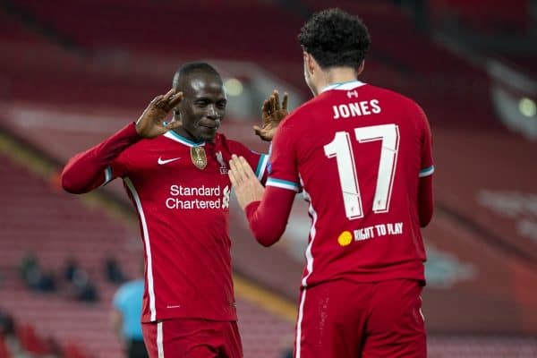 LIVERPOOL, ENGLAND - Tuesday, December 1, 2020: Liverpool's Curtis Jones (R) celebrates with team-mate Sadio Mané (L) after scoring the only goal of the game during the UEFA Champions League Group D match between Liverpool FC and AFC Ajax at Anfield. Liverpool won 1-0 to win the group and progress to the Round of 16. (Pic by David Rawcliffe/Propaganda)