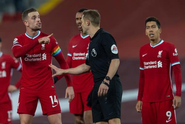 LIVERPOOL, ENGLAND - Sunday, December 6, 2020: Liverpool's captain Jordan Henderson remonstrates with referee Craig Pawson after he awaded Wolverhampton Wanderers a penalty, the decision was later overturned when the referee looked at a replay on the VAR monitor, during the FA Premier League match between Liverpool FC and Wolverhampton Wanderers FC at Anfield. Liverpool won 4-0. (Pic by David Rawcliffe/Propaganda)