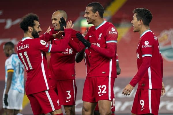 LIVERPOOL, ENGLAND - Sunday, December 6, 2020: Liverpool's Joel Matip (2nd from R) celebrates with team-mates Mohamed Salah, Fabio Henrique Tavares 'Fabinho' and Roberto Firmino after scoring the third goal during the FA Premier League match between Liverpool FC and Wolverhampton Wanderers FC at Anfield. Liverpool won 4-0. (Pic by David Rawcliffe/Propaganda)