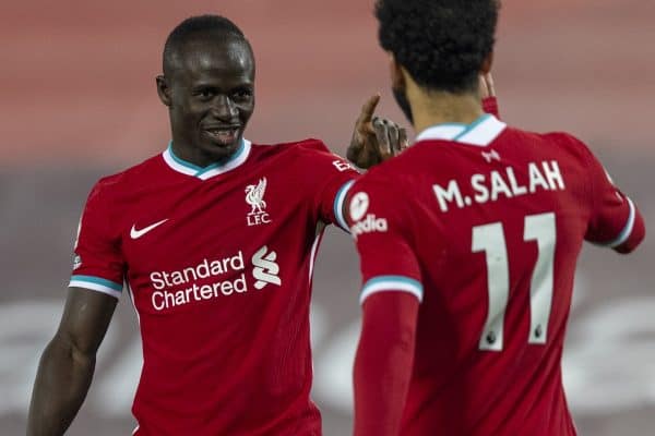 LIVERPOOL, ENGLAND - Sunday, December 6, 2020: Liverpool's Sadio Mané (L) celebrates with team-mate Mohamed Salah after the fourth goal during the FA Premier League match between Liverpool FC and Wolverhampton Wanderers FC at Anfield. Liverpool won 4-0. (Pic by David Rawcliffe/Propaganda)