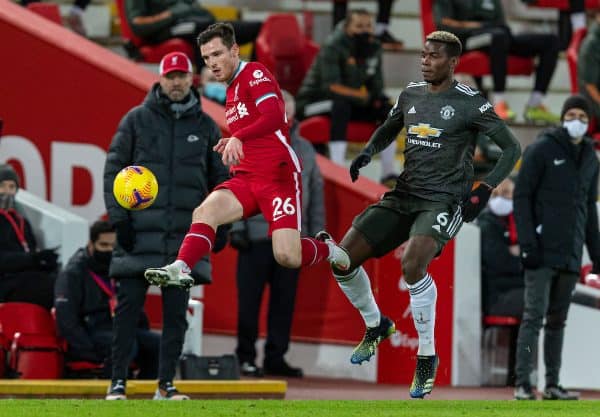 LIVERPOOL, ENGLAND - Sunday, January 17, 2021: Liverpool's Andy Robertson (L) and Manchester United's Paul Pogba during the FA Premier League match between Liverpool FC and Manchester United FC at Anfield. The game ended in a 0-0 draw. (Pic by David Rawcliffe/Propaganda)