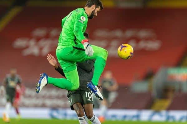 LIVERPOOL, ENGLAND - Sunday, January 17, 2021: Liverpool's goalkeeper Alisson Becker intercepts the ball from Manchester United's Marcus Rashford during the FA Premier League match between Liverpool FC and Manchester United FC at Anfield. The game ended in a 0-0 draw. (Pic by David Rawcliffe/Propaganda)