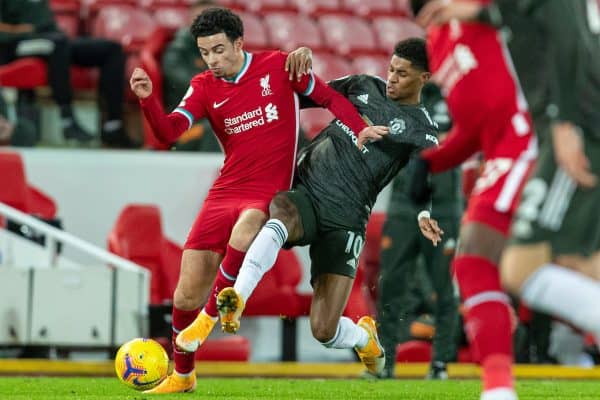 LIVERPOOL, ENGLAND - Sunday, January 17, 2021: Liverpool's Curtis Jones is tackled by Manchester United's Marcus Rashford during the FA Premier League match between Liverpool FC and Manchester United FC at Anfield. The game ended in a 0-0 draw. (Pic by David Rawcliffe/Propaganda)