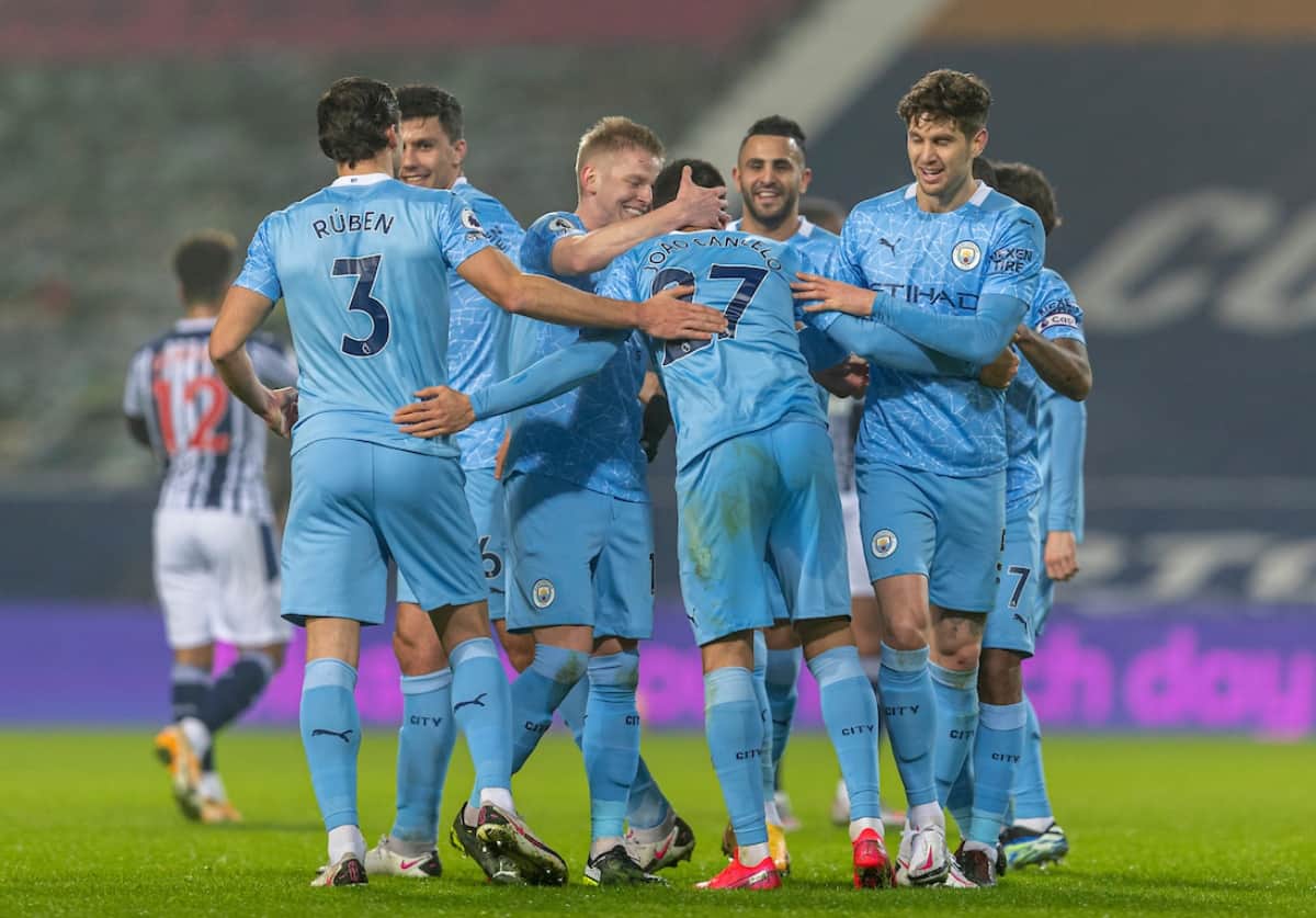 BIRMINGHAM, ENGLAND - Tuesday, January 26, 2021: Manchester City's Joa?o Cancelo (C) celebrates with team-mates after scoring the second goal during the FA Premier League match between West Bromwich Albion FC and Manchester City FC at The Hawthorns. Manchester City won 5-0. (Pic by David Rawcliffe/Propaganda)