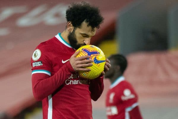 LIVERPOOL, ENGLAND - Sunday, February 7, 2021: Liverpool's Mohamed Salah kisses the ball before scoring the first equalising goal from a penalty kick during the FA Premier League match between Liverpool FC and Manchester City FC at Anfield. Manchester City won 4-1. (Pic by David Rawcliffe/Propaganda)