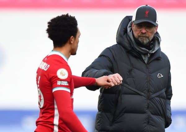 LEICESTER, ENGLAND - Saturday, February 13, 2021: Liverpool's manager Jürgen Klopp and Trent Alexander-Arnold after the FA Premier League match between Leicester City FC and Liverpool FC at the King Power Stadium. Leicester City won 3-1. (Pic by Propaganda)