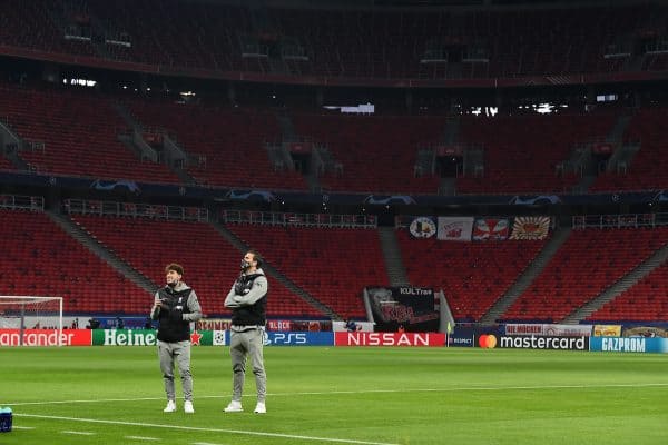 BUDAPEST, HUNGARY - Tuesday, February 16, 2021: Liverpool's Kostas Tsimikas (L) and goalkeeper Alisson Becker inspect the pitch before the UEFA Champions League Round of 16 1st Leg game between RB Leipzig and Liverpool FC at the Puskás Aréna. (Pic by Propaganda)