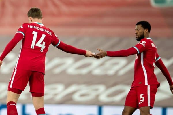 LIVERPOOL, ENGLAND - Saturday, February 20, 2021: Liverpool's captain Jordan Henderson hands the captain's armband to Georginio Wijnaldum (R) as he walks off injured during the FA Premier League match between Liverpool FC and Everton FC, the 238th Merseyside Derby, at Anfield. Everton won 2-0, the club’s first win at Anfield since 1999. (Pic by David Rawcliffe/Propaganda)