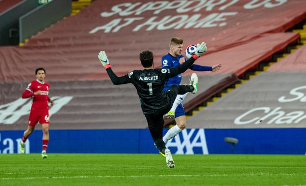 LIVERPOOL, ENGLAND - Thursday, March 4, 2021: Chelsea's Timo Werner gets to the ball before Liverpool's goalkeeper Alisson Becker during the FA Premier League match between Liverpool FC and Chelsea FC at Anfield. Chelsea won 1-0 condemning Liverpool to their fifth consecutive home defeat for the first time in the club’s history. (Pic by David Rawcliffe/Propaganda)