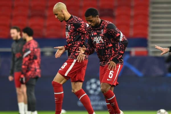 BUDAPEST, HUNGARY - Wednesday, March 10, 2021: Liverpool's Fabio Henrique Tavares 'Fabinho' (L) and Georginio Wijnaldum (R) during the pre-match warm-up before the UEFA Champions League Round of 16 2nd Leg game between Liverpool FC and RB Leipzig at the Puskás Aréna. Liverpool won 2-0, 4-0 on aggregate. (Pic by Propaganda)