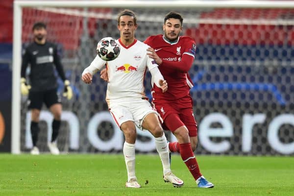 BUDAPEST, HUNGARY - Wednesday, March 10, 2021: Liverpool's Ozan Kabak (R) and RB Leipzig's Yussuf Poulsen during the UEFA Champions League Round of 16 2nd Leg game between Liverpool FC and RB Leipzig at the Puskás Aréna. Liverpool won 2-0, 4-0 on aggregate. (Pic by Propaganda)