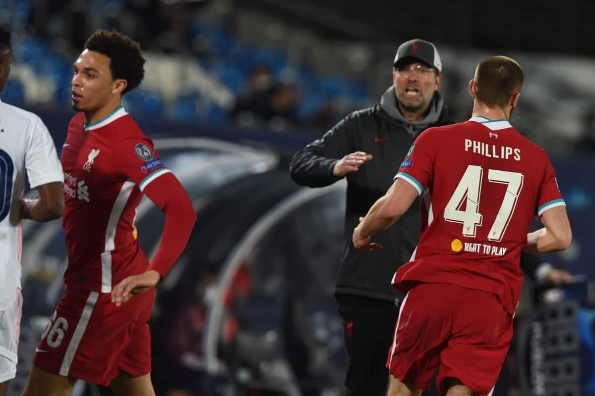 MADRID, SPAIN - Tuesday, April 6, 2021: Real Madrid's Vini?cius Ju?nior clashes with Liverpool's Trent Alexander-Arnold during the UEFA Champions League Quarter-Final 1st Leg game between Real Madird CF and Liverpool FC at the Estadio Alfredo Di Stefano. (Pic by Propaganda)