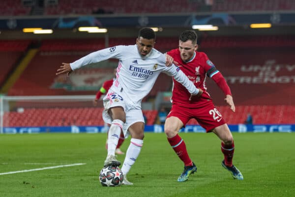 LIVERPOOL, ENGLAND - Wednesday, April 14, 2021: Real Madrid's Rodrygo Silva de Goes (L) and Liverpool's Andy Robertson during the UEFA Champions League Quarter-Final 2nd Leg game between Liverpool FC and Real Madird CF at Anfield. The game ended in a goal-less draw, Real Madrid won 3-1 on aggregate. (Pic by David Rawcliffe/Propaganda)