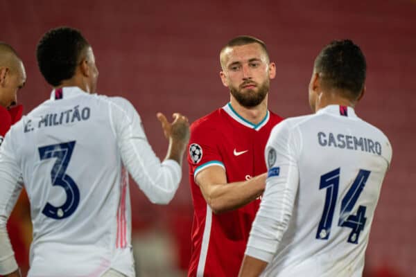 LIVERPOOL, ENGLAND - Wednesday, April 14, 2021: Liverpool's Nathaniel Phillips (L) and Real Madrid's Carlos Henrique Casimiro shake hands after the UEFA Champions League Quarter-Final 2nd Leg game between Liverpool FC and Real Madird CF at Anfield. The game ended in a goal-less draw, Real Madrid won 3-1 on aggregate. (Pic by David Rawcliffe/Propaganda)