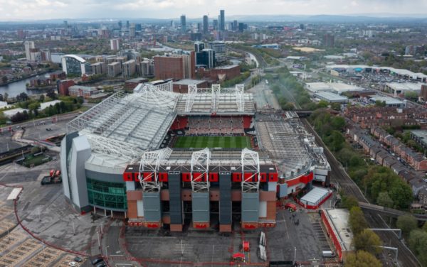 MANCHESTER, ENGLAND - Sunday, May 2, 2021: Green smoke rises as supporters protest against the American owners of Manchester United at Old Trafford ahead of the FA Premier League match between Liverpool FC and Manchester United FC. The game was eventually postponed after supporters got access to the pitch. (Pic by David Rawcliffe/Propaganda)