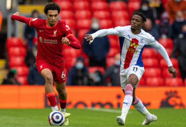 LIVERPOOL, ENGLAND - Sunday, May 23, 2021: Liverpool's Trent Alexander-Arnold (L) gets away from Crystal Palace's Wilfried Zaha during the final FA Premier League match between Liverpool FC and Crystal Palace FC at Anfield. Liverpool won 2-0 and finished 3rd in the table. (Pic by David Rawcliffe/Propaganda)