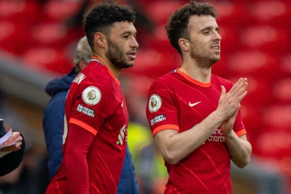 LIVERPOOL, ENGLAND - Sunday, May 23, 2021: Liverpool substitutes Alex Oxlade-Chamberlain (L) and Diogo Jota prepare to come on during the final FA Premier League match between Liverpool FC and Crystal Palace FC at Anfield. Liverpool won 2-0 and finished 3rd in the table. (Pic by David Rawcliffe/Propaganda)