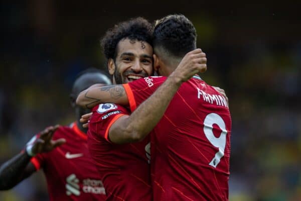 NORWICH, ENGLAND - Saturday, August 14, 2021: Liverpool's Roberto Firmino (R) celebrates with team-mate Mohamed Salah after scoring the second goal during the FA Premier League match between Norwich City FC and Liverpool FC at Carrow Road. (Pic by David Rawcliffe/Propaganda)