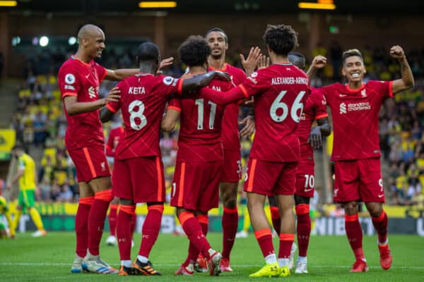 NORWICH, ENGLAND - Saturday, August 14, 2021: Liverpool's Mohamed Salah (#11) celebrates with team-mates after scoring the third goal during the FA Premier League match between Norwich City FC and Liverpool FC at Carrow Road. (Pic by David Rawcliffe/Propaganda)