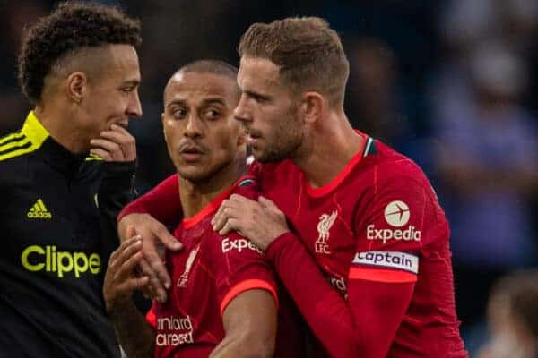 LEEDS, ENGLAND - Sunday, September 12, 2021: Liverpool's Thiago Alcantara and captain Jordan Henderson with Leeds United's Raphael Dias Belloli 'Raphinha' during the FA Premier League match between Leeds United FC and Liverpool FC at Elland Road. Liverpool won 3-0. (Pic by David Rawcliffe/Propaganda)