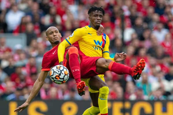 LIVERPOOL, ENGLAND - Saturday, September 18, 2021: Liverpool's Fabio Henrique Tavares 'Fabinho' (L) is fouled by Crystal Palace's Wilfried Zaha during the FA Premier League match between Liverpool FC and Crystal Palace FC at Anfield. Liverpool won 3-0. (Pic by David Rawcliffe/Propaganda)