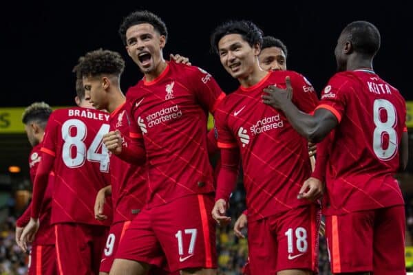 NORWICH, ENGLAND - Tuesday, September 21, 2021: Liverpool's Takumi Minamino (#18) celebrates with team-mates after scoring the first goal during the Football League Cup 3rd Round match between Norwich City FC and Liverpool FC at Carrow Road. Liverpool won 3-0. (Pic by David Rawcliffe/Propaganda)